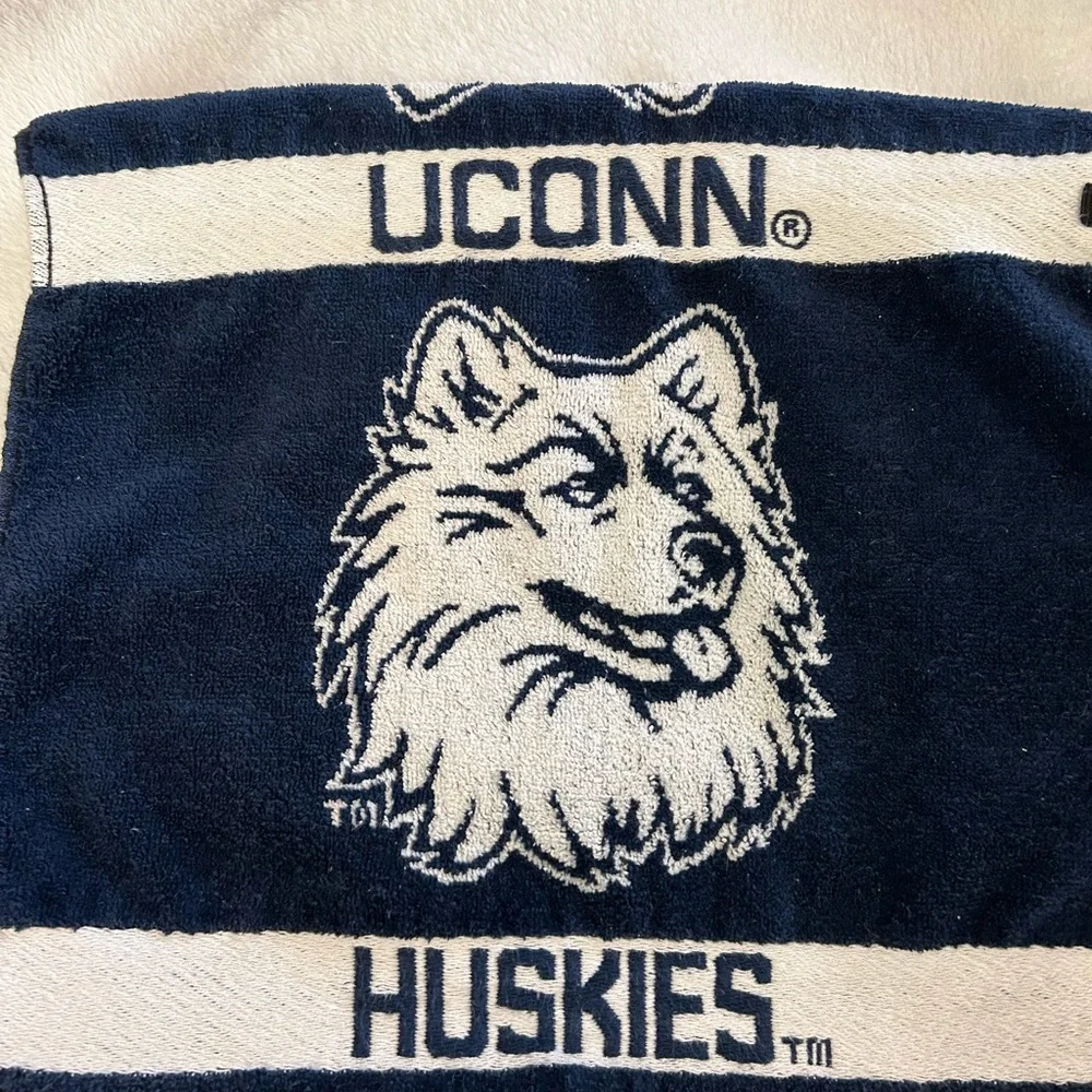 From team effort, UConn Husky towel, navy and white